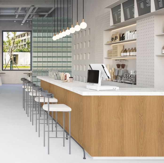 Cafe counter in oak and terrazzo with green tiling behind