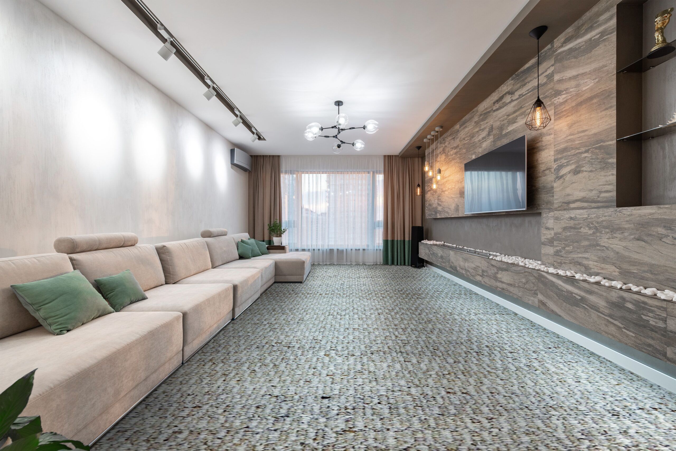 Floor-to-ceiling drapery filtering soft daylight in a contemporary room