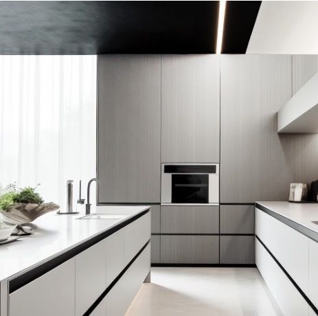 Linear grey kitchen with full-height cabinet fronts and a white island