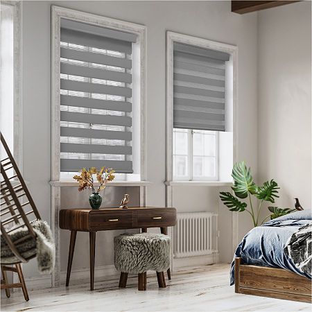 Zebra shades on two bedroom windows, half open