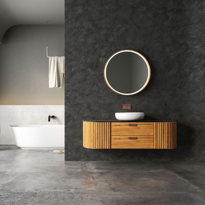 Fluted timber vanity against a charcoal plaster wall